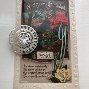 Vintage birthday postcard with vintage English brooch